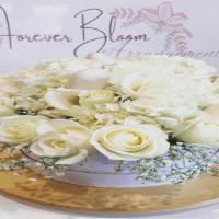 White Classic · A combination of white flowers, with white chocolate strawberries. (Flowers and/or vase/cont...
