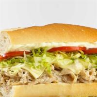 Chicken Cheese Steak Hoagie · Chicken Cheese Steak served with lettuce, tomatoes and American Cheese on a fresh Italian Ro...