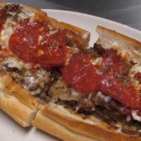 Pizza Cheese Steak · Philly Cheese Steak served with homemade Marinara Sauce and Mozzarella Cheese on a fresh toa...