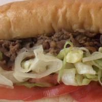 Cheese Steak Hoagie · Philly Cheese Steak served with lettuce, tomatoes and American Cheese on a fresh Italian Roll.
