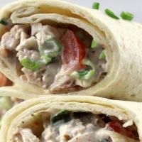 Chicken Salad Wrap · Homemade Chicken Salad, with Americn Cheese, Lettuce, Tomato and your choice of Wrap with ch...
