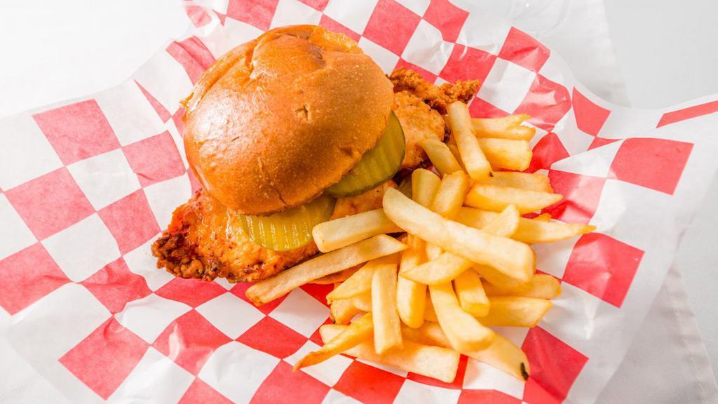 Crispy Chicken With Fries · Buttermilk Fried Chicken Breast served with Mayo and Pickles on Toasted Brioche Bun with Crispy French Fries.