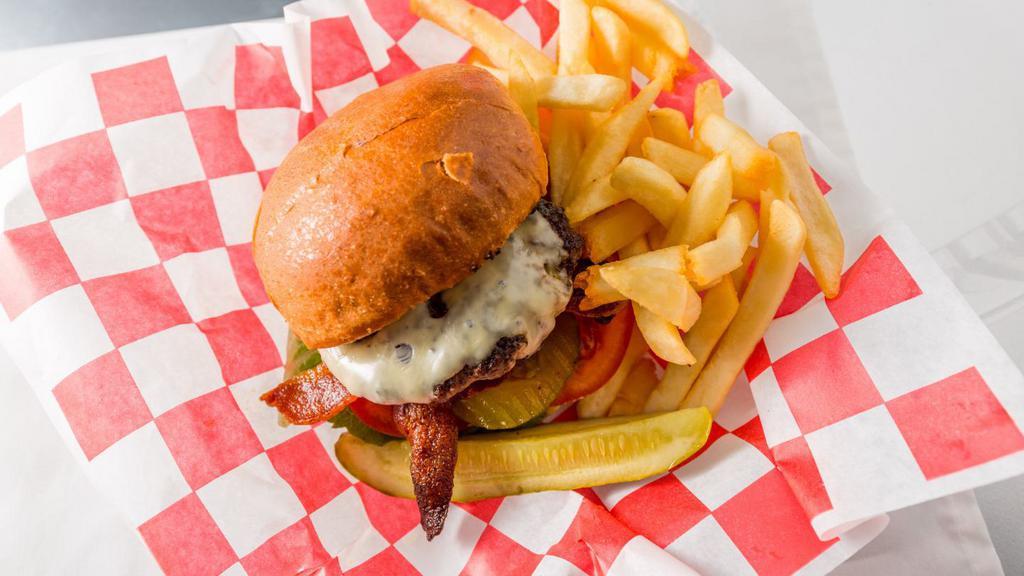 Bacon Cheese Burger · Charbroiled Burger (Fresh never Frozen) served with American cheese, Crispy Bacon, Lettuce and Tomato on a toasted brioche bun.