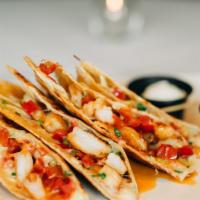 Chicken Quesadilla · seasoned chicken breast, shredded pepperjack cheese, diced red peppers, scallions, salsa, so...