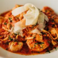 Seafood Fra Diavlo · jumbo shrimp, scallops, lobster, linguini, spicy tomato sauce, shaved parmesan