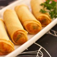 Vegetable Spring Roll · Fried vegetable roll with sweet chili sauce.