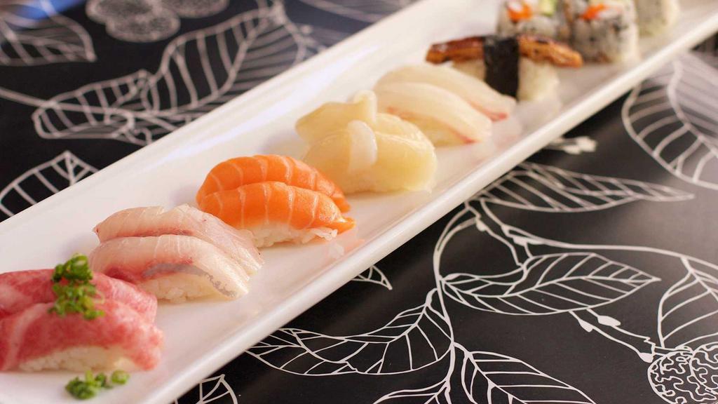 Super Fuji · Assortment of premium fish with spicy scallop roll.
