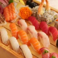 Matsu · Chef’s choice of sushi, sashimi with one shrimp tempura roll and one Dragon roll.