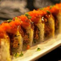 White Tiger · Spicy tuna, crunch topped with seared white tuna, masago, scallion, and spicy sauce.