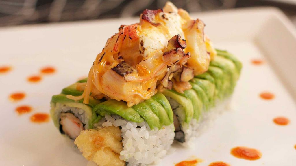 Washington · Shrimp tempura topped with avocado, octopus, and spicy cream sauce.