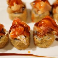 Katsu Roll · Ginger, cream cheese, spicy tuna deep fried, topped with spicy trio, spicy sauce, and eel sa...