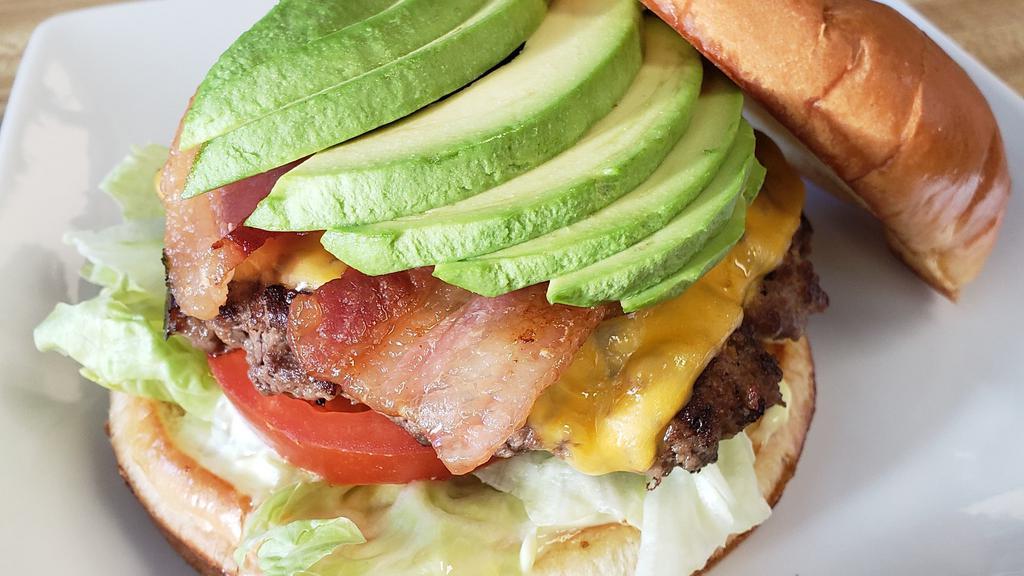 California Burger · Homemade dressing, bacon, American cheese, and avocado.