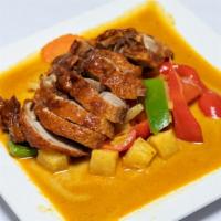 Yellow Curry · Spicy! Gluten free. Favorite. Yellow madras curry and coconut milk with pineapple, bell pepp...