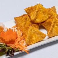 Crab Rangoon · Favorite. Stuffed with imitation crabmeat, cream cheese, onion carrot served with sweet and ...