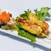 Chicken Satay · Gluten free. Marinated in coconut milk and Thai herbs, grill on a skewer served with peanut ...