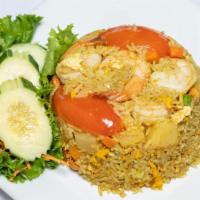 Pineapple Fried Rice · Gluten free. Favorite. Stir-fried with pineapple, tomatoes, cashew nuts, egg and curry powder.
