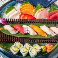 Sushi & Sashimi Comb · 6 pieces of assorted sushi, 9 pieces of assorted sashimi and california roll.