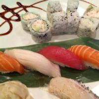 Sushi & Sashimi For Two · 10 pieces of assorted sushi, 15 pieces of raw fish, tuna avocado roll and berwyn roll.