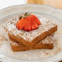 French Toast · 2 pieces of Texas toast dipped in our special batter topped with powder sugar and cinnamon. ...