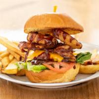 Bbq Bacon · BBQ bacon burger marinated in BBQ sauce, topped with beer battered onion rings.