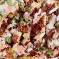 Loaded Chicken Bacon Ranch Fries · Fries covered with fried chicken,  bacon, cheese sauce, ranch dressing, & HB sauce.