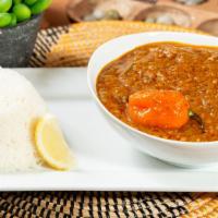 Soup Kandja (Okra Stew) · Stew of finely chopped okra, seafood, and habanero pepper cooked in palm oil and served with...
