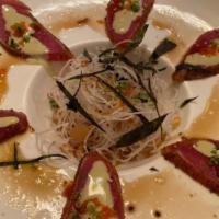 Tuna Sashimi (8)
 · Served with choice of miso soup or green salad.