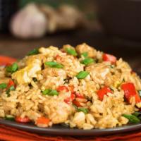 Chicken Fried Rice · Aromatic rice dish made with basmati rice, stir fried with chicken and spices.