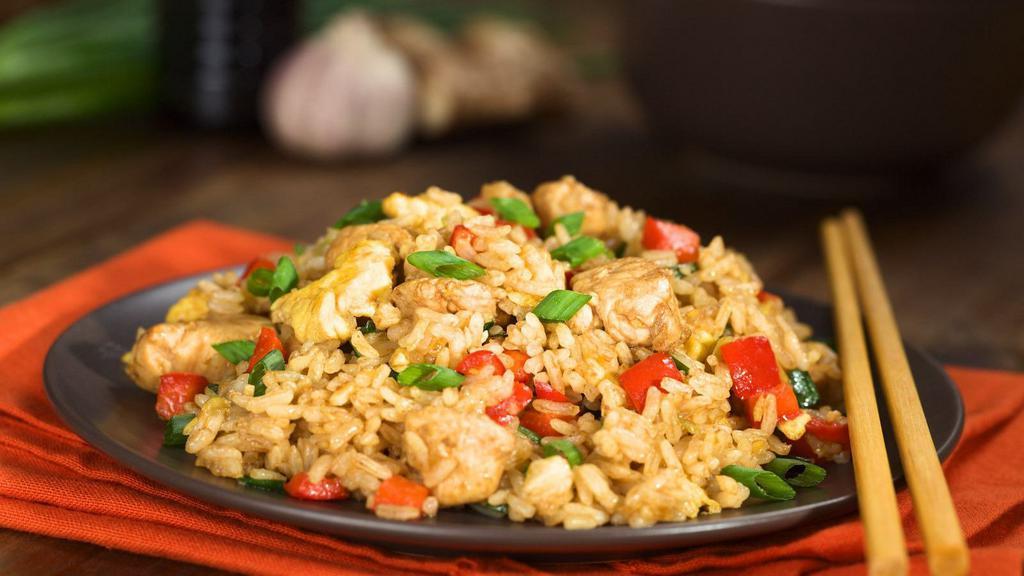 Chicken Fried Rice · Aromatic rice cooked with chicken and garden fresh vegetables.