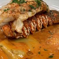 Lobster Ravioli · Lobster filled ravioli, served with a lobster tail in a blush sauce