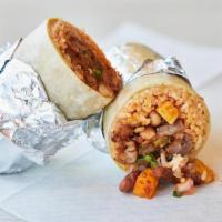 Regular Al Pastor Burrito · Marinated pork cooked on a rotisserie with pineapple and onion