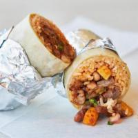 Super Al Pastor Burrito · Marinated pork cooked on a rotisserie with pineapple and onion
