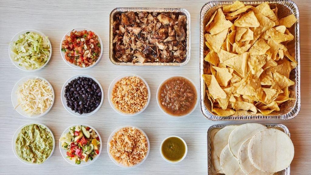 Take Home Taco Kit · Taco Time!  Your taco kit comes with Chicken, Vegetables, Vegetarian Rice, Black Beans, Shredded Lettuce, Shredded Cheese, Pico (mild), Hot Sauce, and 15 Corn Tortillas.  Chips, Guacamole, and Chip Salsa (Medium) included on the side.. No substitutions available.