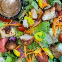 House · Romaine, cucumber, tomato, red onion, carrot, crouton, banana pepper and red wine vinaigrette.