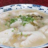 Fish Filet With Sour Napa / 东北酸菜鱼 · Fish Filet Cooked in Homemade Sour Napa Broth.