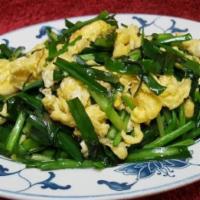 Egg And Leeks / 韭菜炒鸡蛋 · Stir-fried Egg & Chives.