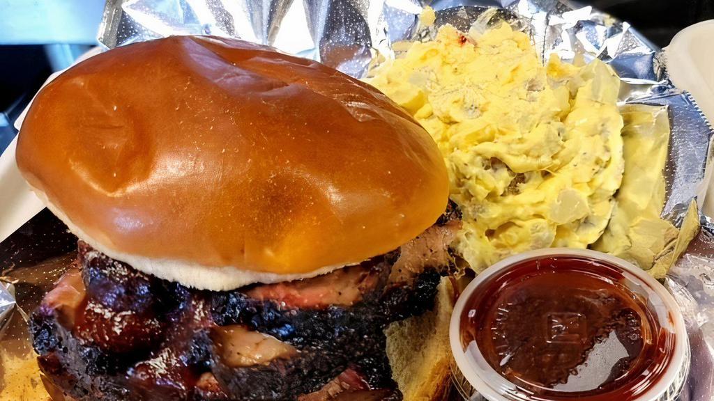 Brisket Sandwich · Sliced and pulled with choice of sauce
