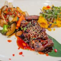 Beef Hibachi · Grilled Ribeye Steak with stir-fried vegetables, house-made hibachi sauce and white rice.