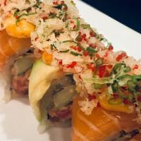 Salmon Volcano Roll · Spicy tuna, king crab and cucumber topped with salmon, avocado, spicy mayo and special crunch.