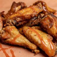 6 Wings · All wings are smoked in our oven and then slowly roasted to perfection.