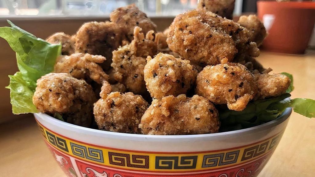 Fried Onion Poppers · Taiwanese fried onion poppers (tastes like little onion rings). Served w/side of General's sauce for dipping. (vegan / gluten free)

*Sorry NO SUBSTITUTES other then the options available! 
*Our entire menu is 100% plant-based & Kosher certified.