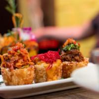 Mofónguito De Yuca · Fried yucca basket served with yo your choice of beef, shrimp or shredded chicken