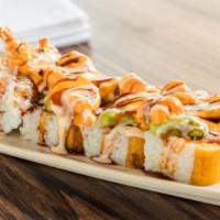 La Pela Roll · Shrimp tempura, cream cheese, maduro, guacamole and seafood mix