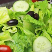 Garden Salad · Romaine lettuce, cherry tomato, cucumber, black olives.