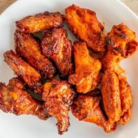 Wings · Deep-fried chicken wings with choice of sauce.