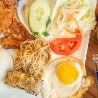 Cơm Suòn Đặc Biệt / Pork Chop Combo Rice · Pork Chop Egg Quiche Pork Skin, and Sunny Side Egg.