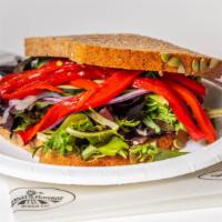 Garden Veggie · Garlic and herb cheese, roasted red peppers, red onion, cucumbers, tomatoes and field greens.