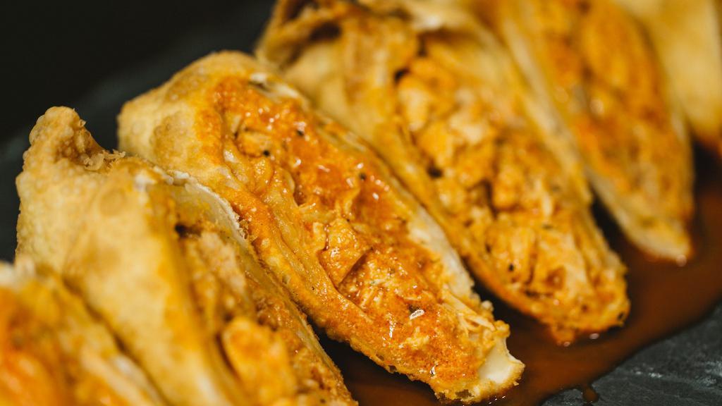 Buffalo Chicken Egg Roll · buffalo chicken egg roll served with our house buffalo sauce