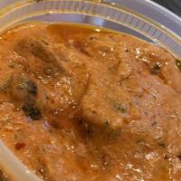 Chicken Tikka Masala · Boneless chicken prepared tandoori style and cooked with a rich tomato cream sauce.