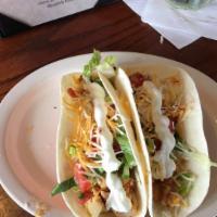 Soft Chicken Tacos · Three soft flour tacos, tender seasoned chicken breast, cheese, lettuce, tomato, and Mexican...